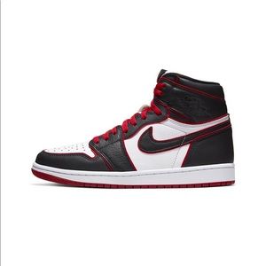 Red, white, and black Nike Jordan 1